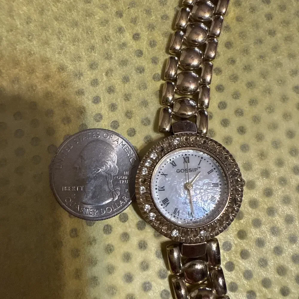 Gossip gold tone